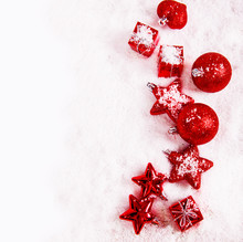 Red Christmas Decoration Covered With Snow