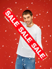 Poster - handsome man with sale sign