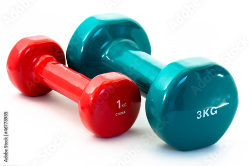Fotografia Blue and red fitness dumbbells isolated on white background