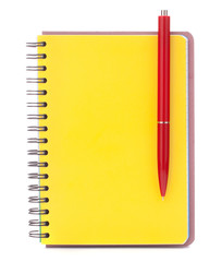 Yellow cover notebook with red pen