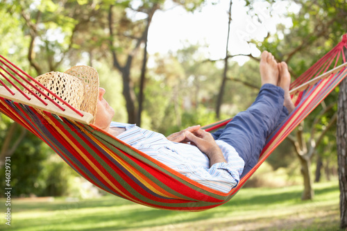 Fotografía Senior Man Relaxing In Hammock