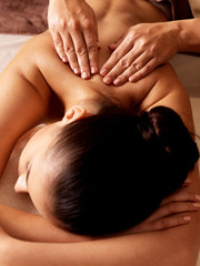 Wall Mural - Woman having massage in the spa salon