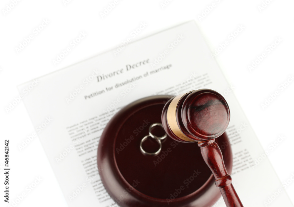 Divorce decree and wooden gavel on white background