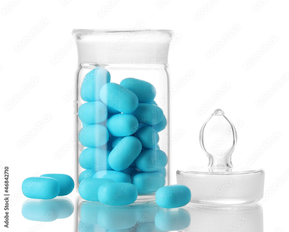 Transparent bottle with pills isolated on white