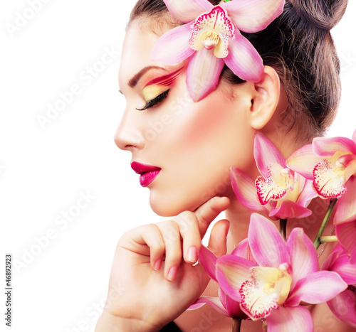 Naklejka na szybę Beauty Portrait. Beautiful Stylish Girl with Orchid Flower