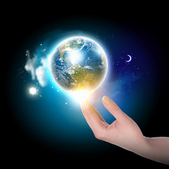 Wall Mural - hand touching the earth