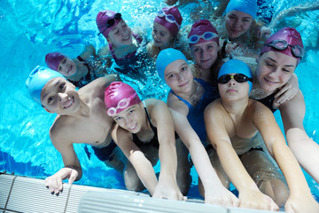 Wall Mural - happy children group  at swimming pool