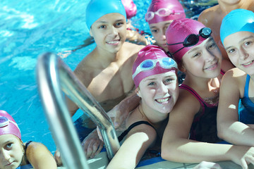 Wall Mural - happy children group  at swimming pool