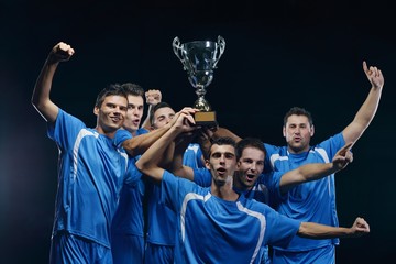 Wall Mural - soccer players celebrating victory