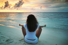 Yoga Woman On Beach At Sunset