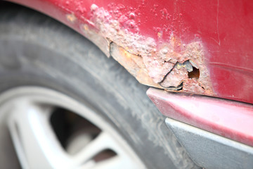 Close up of old rusty car door