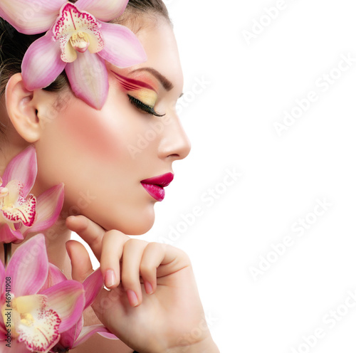 Naklejka dekoracyjna Beauty Portrait. Beautiful Stylish Girl with Orchid Flower