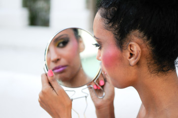 Wall Mural - Beautiful black girl with mirror