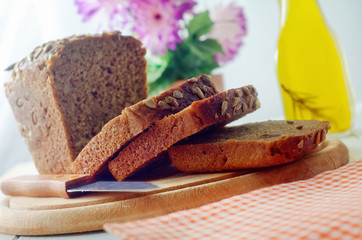 Sticker - Fresh bread and knife on the wooden board