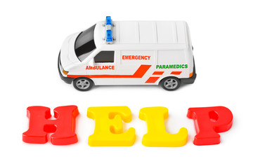 Wall Mural - Toy ambulance car and word help