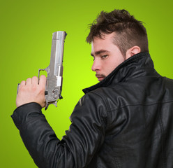 Portrait Of A Man Holding Gun