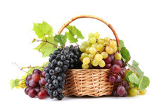 Assortment Of Ripe Sweet Grapes In Basket, Isolated On White.
