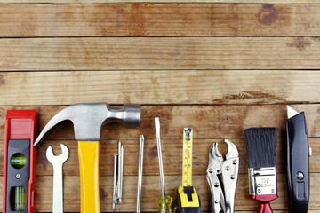 Poster - Assorted carpentry work tools on wood, Copy space 