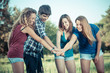 © william87 - Group of Teenagers with Hands on Stack