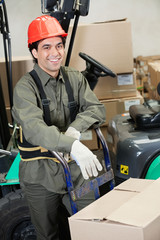 Wall Mural - Foreman Leaning On Handtruck At Warehouse