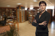 © patrisyu - businesswoman in a library