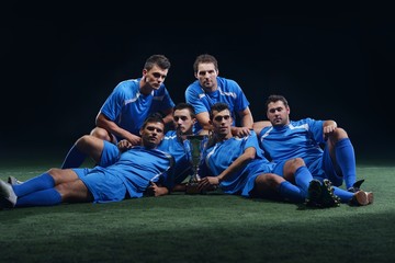 Wall Mural - soccer players celebrating victory