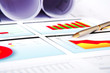 © adam121 - business documents with charts and drawings