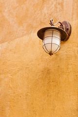 Italian lamp on orange wall