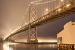 Daybreak with foggy night sky at Bay Bridge , San Francisco
