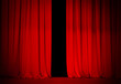 red curtain on theater or cinema stage slightly open