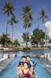 © Creativa Images - Happy Asian Family on Vacatiopn