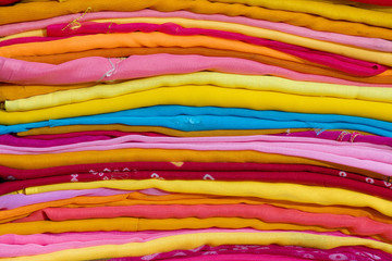 Block colorful fabrics on display at a local market in India