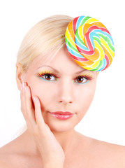 Wall Mural - portrait of blonde young girl with lollipop, fashion makeup