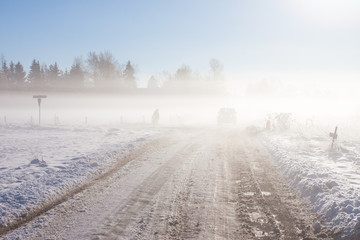 Wall Mural - Winter road with off-road car