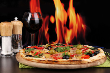 Poster - Delicious pizza with glass of red wine and spices