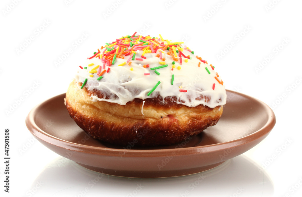 Tasty donut on color plate isolated on white