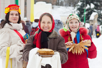 women with pancake during Pancake Week