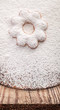 Cookies in the shape of a flower covered powdered sugar, (backgr