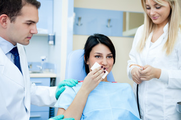 Wall Mural - Dentist working