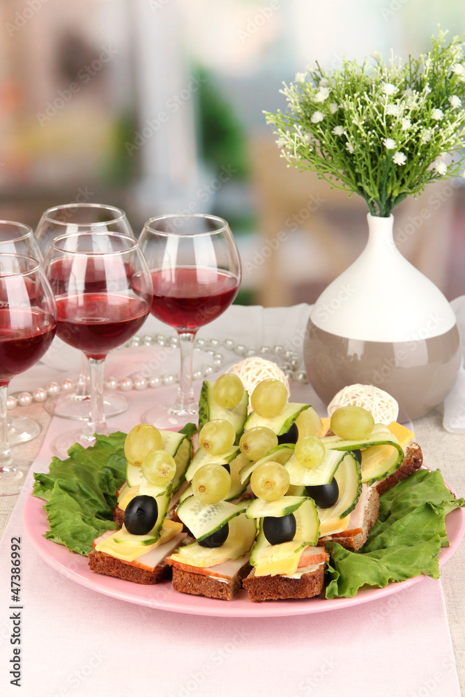 Canapes and wine in restaurant