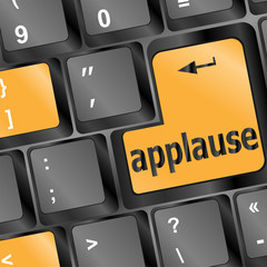 Poster - Computer keyboard with applause key - business concept
