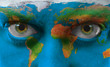 Human face with painted map of world