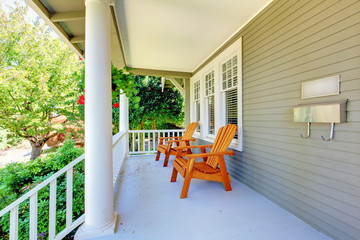 Wall Mural - Front porch with chairs and columns.