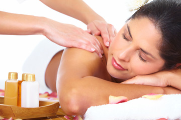 Sticker - Young woman getting massage in spa salon.