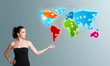 Young woman presenting colorful world map