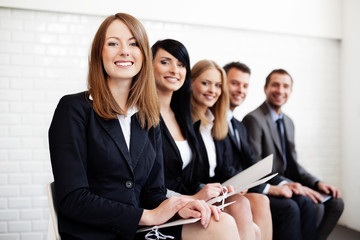 Poster - Successful businesswoman in group of people