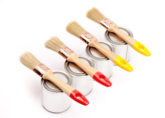 Poster - Cans of paint with paintbrushes isolated on white