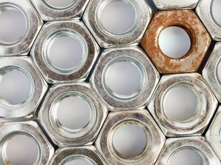 Metal nuts arranged in a plane 2