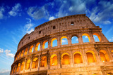 Fototapeta  - Beautiful dramatic sky over Colosseum in Rome