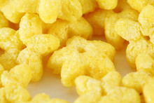Close Up Of Corn Flakes As Asterisks For Healthy Breakfast